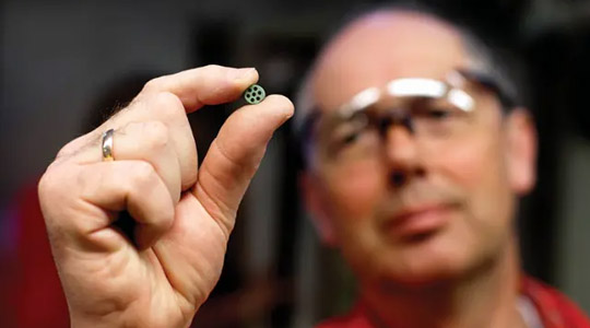 Fertilizer production worker holding a catalyst